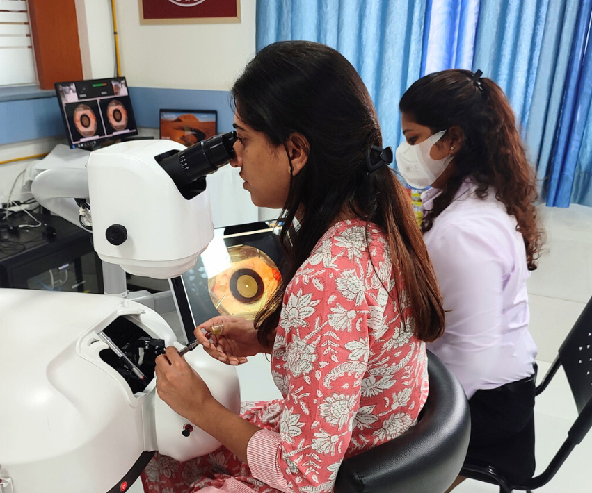 A surgeon trains on a HelpMeSee simulator that prepares ophthalmologists to perform cataract surgery safely.