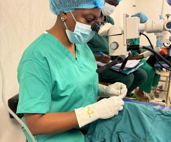 Dr. Sheriff performs cataract surgery in an operating room to restore sight for patients in underserved communities.